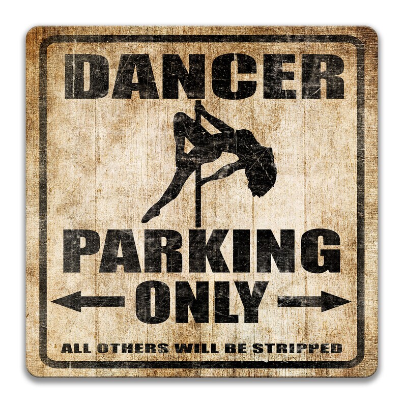 May include: A vintage-style sign with a distressed, brown background. The sign reads "Dancer Parking Only" with an arrow pointing to the left and an arrow pointing to the right. The text "All Others Will Be Stripped" is printed below the arrows.