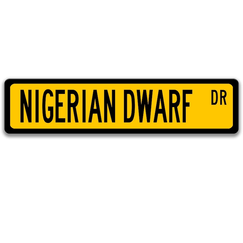 May include: A yellow road sign with black text and a black border. The sign reads "NIGERIAN DWARF DR".