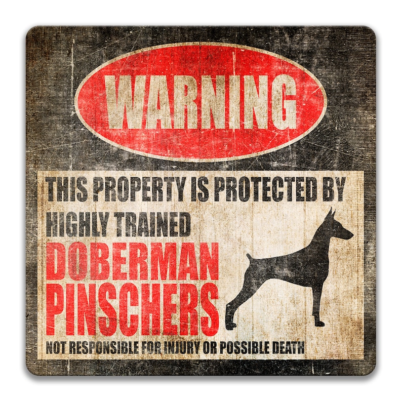 May include: A warning sign with a red circle and the word "WARNING" in white. The sign reads "This property is protected by highly trained Doberman Pinschers. Not responsible for injury or possible death." A black silhouette of a Doberman Pinscher is shown.