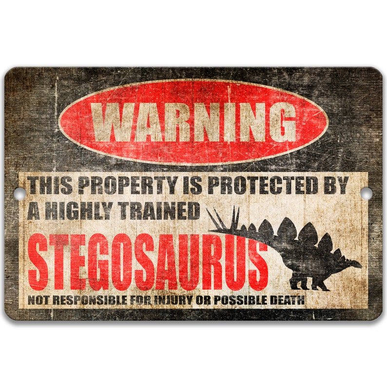 May include: A warning sign with a distressed, vintage look. It reads "WARNING THIS PROPERTY IS PROTECTED BY A HIGHLY TRAINED STEGOSAURUS NOT RESPONSIBLE FOR INJURY OR POSSIBLE DEATH". The sign features a black silhouette of a stegosaurus.
