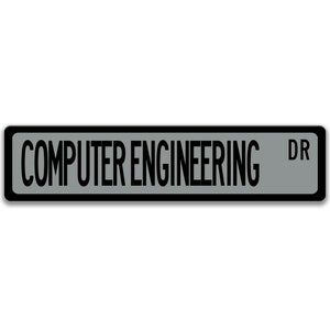 May include: A black and white street sign with the text "COMPUTER ENGINEERING DR" on a gray background.