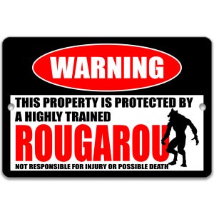 May include: A rectangular sign with a black background and a red oval containing the word "WARNING". The sign features the text "THIS PROPERTY IS PROTECTED BY A HIGHLY TRAINED ROUGAROU" and a werewolf silhouette. The bottom text reads "NOT RESPONSIBLE FOR INJURY OR POSSIBLE DEATH."