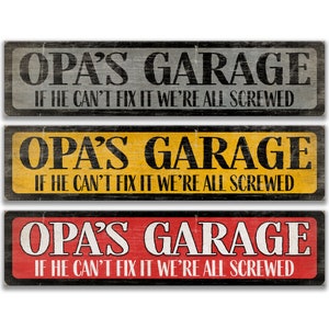 May include: Three wooden signs with black lettering on a distressed wood background. The signs read "OPA'S GARAGE IF HE CAN'T FIX IT WE'RE ALL SCREWED". The signs are in gray, yellow, and red.