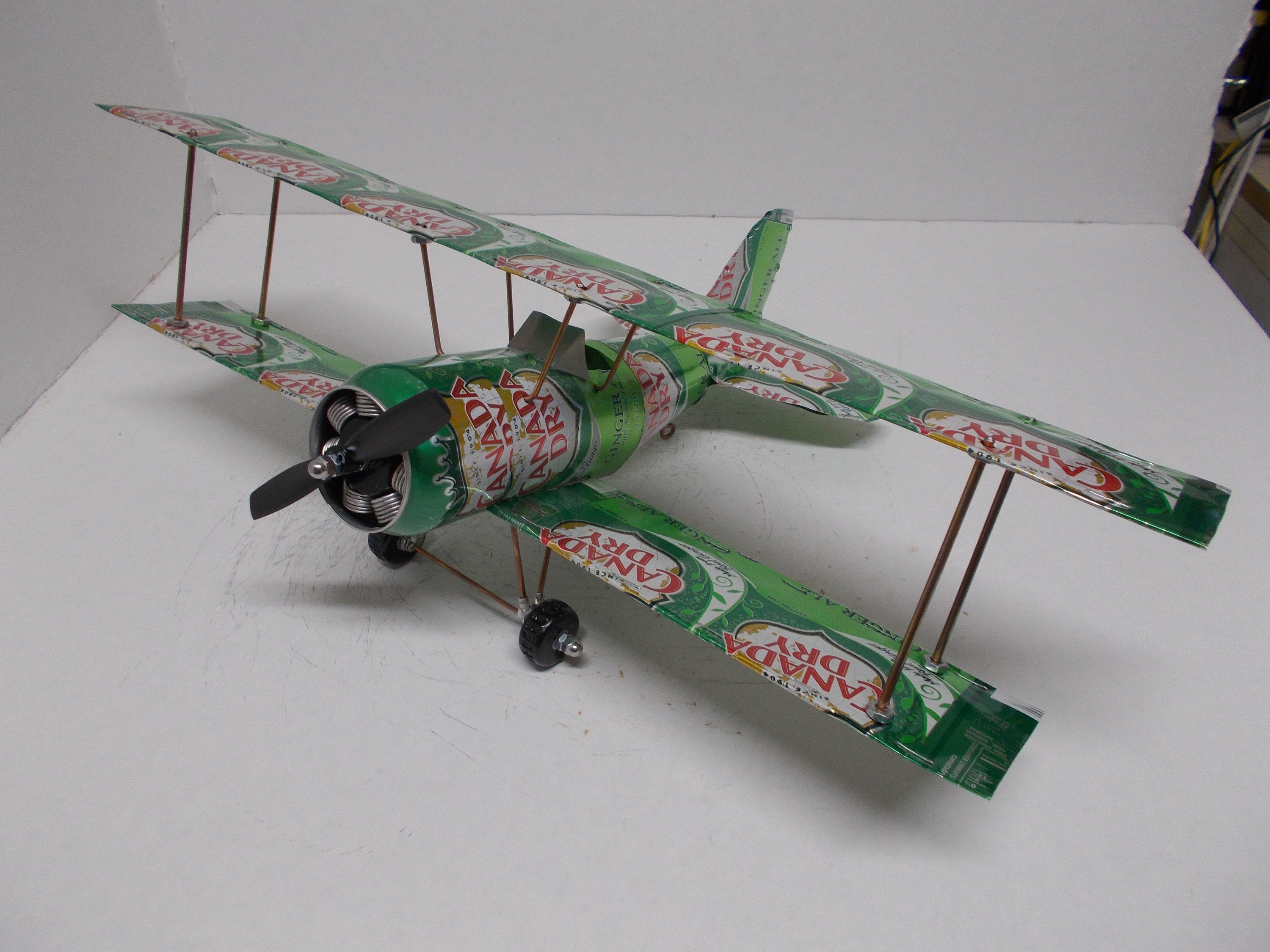 soda can aluminum handcrafted airplane (canada dry ) bi-plane - etsy