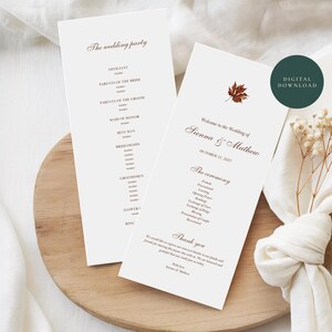 May include: Two white wedding program cards with dark text and a small brown maple leaf graphic. The text includes "The wedding party," "Welcome to the Wedding of Sienna & Matthew," "The ceremony," and "Thank you." A dark green circle reads "DIGITAL DOWNLOAD."