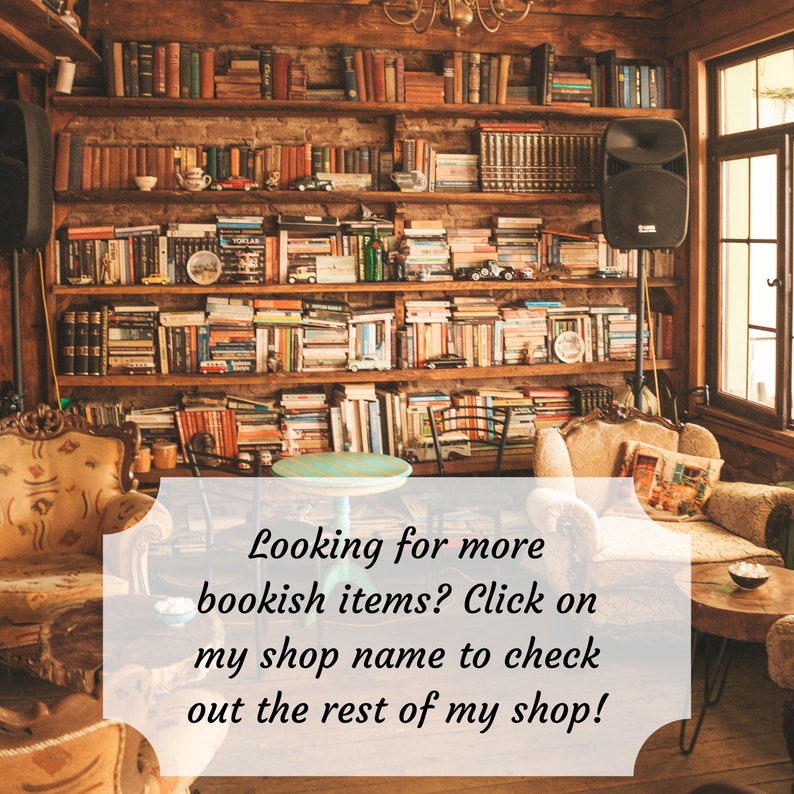 May include: A rustic wooden bookshelf filled with books, with two armchairs and a small table in front of it. The text "Looking for more bookish items? Click on my shop name to check out the rest of my shop!" is written on a white rectangle in front of the bookshelf.