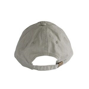 May include: A plain, light grey baseball cap with a brown adjustable strap.