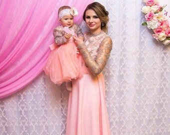 baby and mother dress