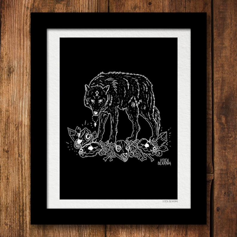 May include: A black and white illustration of a wolf standing on a pile of bones and skulls. The wolf has a symbol on its forehead and is surrounded by crystals. The text "VIKEN BERKANA" is at the bottom of the image.