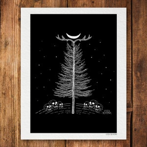 May include: A black and white illustration of a bare tree with antlers and a crescent moon above it. Three skulls are at the base of the tree. The artist's signature, "Vixen Bergman", is in the bottom right corner.