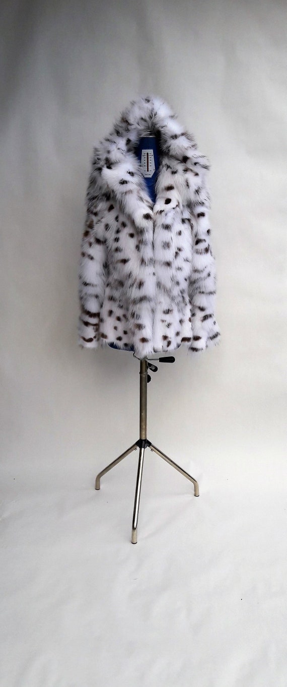 white hooded fur jacket