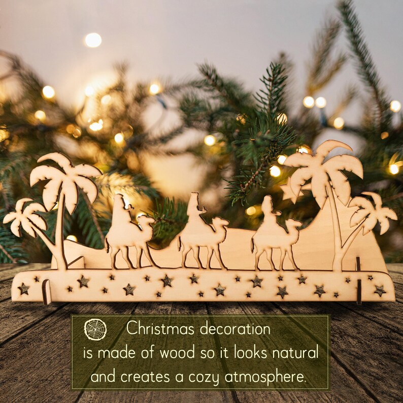 Wooden Christmas decoration three wise kings in daylight. The decoration is made of natural wood. Unvarnished.