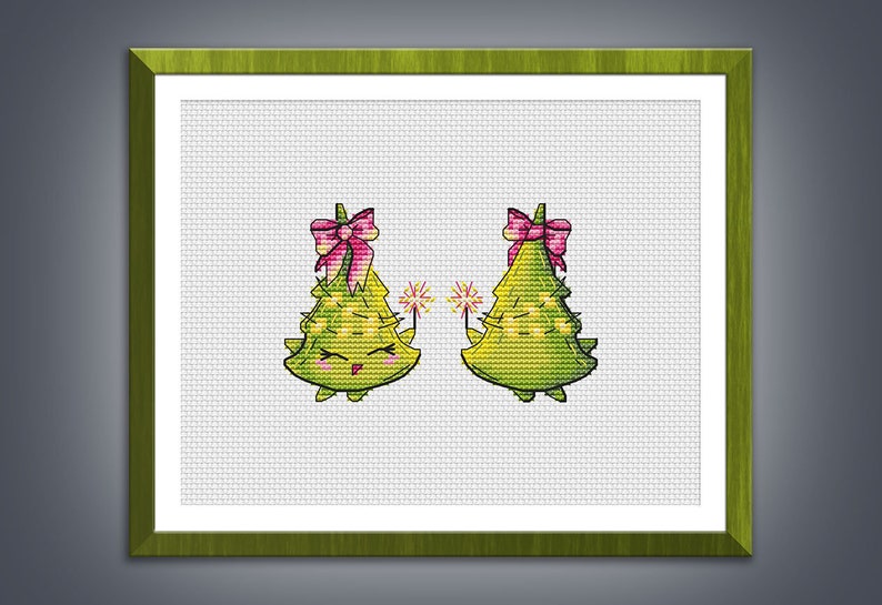 May include: Two green Christmas trees with pink bows and happy faces holding sparklers. The trees are on a white background.