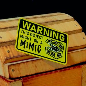 Advertencia: el objeto podría ser una pegatina imitadora / pegatina de dnd mazmorras y dragones