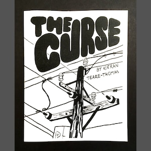 May include: Black and white illustration of a comic book cover with the title "The Curse" in bold, bubble letters. The cover features a black and white illustration of a wooden utility pole with electrical wires.