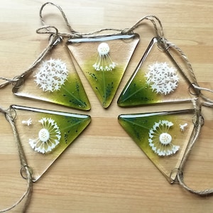 Dandelion glass bunting, beautiful Dandelion heads in glass bunting, glass bunting for the garden, dandelions in glass.