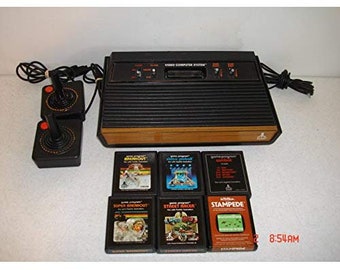 Vintage Atari 2600 Bundle With 6 Games and 2 joysticks
