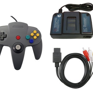 May include: A gray Nintendo 64 controller, a black power adapter, a black AV cable, and a gray transfer pak.