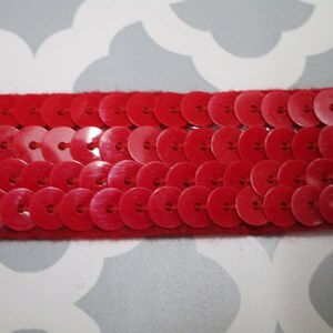 a piece of 3/4 yards in 7/8&quot; width in red color sequined ribbon trim for your fashion design and sewing project.