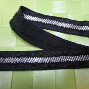 1 3/4 yards in 3/4&quot; width in black color with silver beads elastic trim for your fashion design/headband/swim wear design decor.