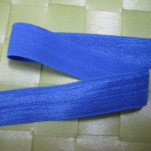 10 3/8 yards in 5/8&quot; width in medium blue color fold over elastic trim for your fashion design/headband/swim wear design decor.
