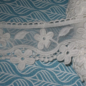 2 yards in 2 1/2&quot; width in white color in poly cotton & tulle novelty trim with floral pattern for your fashion/weddiing project