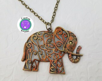 Large bohemian elephant necklace, large bronze boho filigree elephant necklace with rhinestone eye sunset colors, gift box included