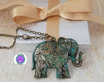 Large bohemian elephant pendant necklace, bronze, green and blue boho filigree elephant necklace with blue rhinestone eye, gift box included