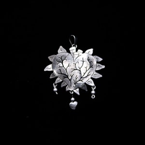 Traditional Mexican folk art jewelry pendant unusual Mazahua Sacred Milagros flaming Boho heart charm Taxco silver jewelry pendant