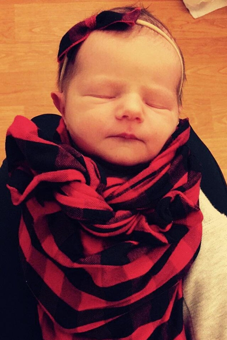 red baby swaddle