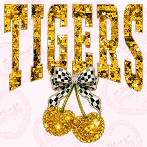 May include: A graphic design featuring the word "TIGERS" in gold sequins. Below the word is a bow with a black and white checkered pattern and two golden cherry-shaped ornaments. The background is light pink.