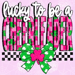 May include: A pink graphic with the words "lucky to be a cheerleader" in white. The word "cheerleader" is in a pink and green plaid pattern. A green bow with white shamrocks and a pink shamrock in the center is at the bottom.