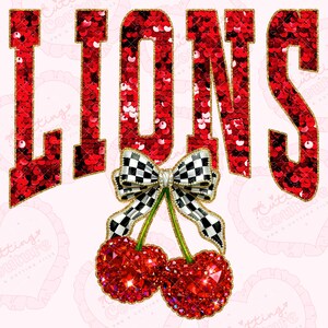 May include: A graphic design with the word "LIONS" in red sequin-filled letters with gold trim. Below the word is a black and white checkered bow with green stems and two red jewel-encrusted cherries. The background is light pink.