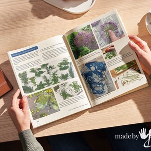 May include: An open book with instructions on how to manage plant specimens for crafting. The book features images of various plants and a finished fabric project with a blue and white pattern.