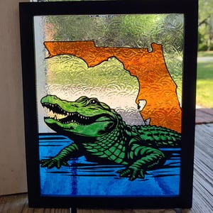State of Florida with alligator; Orange and Blue; Painted stained glass; Hand-painted; Black frame; 8&quot;X10&quot;