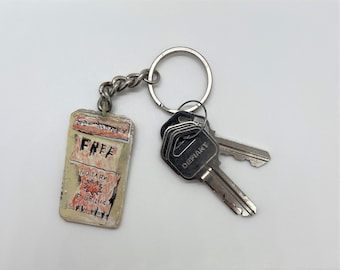 one of a kind upcycled basquiat key chain