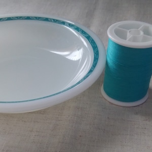 vintage Pyrex Tableware small bowl, milk glass with turquoise leaf border.