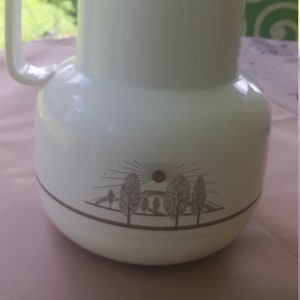 West German Gezi carafe/thermos from the 70&#39;s.  White with pretty little scene with trees and sun.