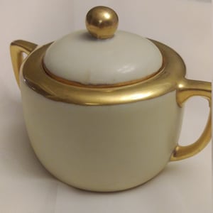 Vintage sugar dish with lid.  Japanese, off white with gold trim.