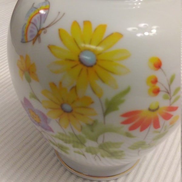 Vintage small Irice vase.  Painted flowers and butterflies.  Gold decor around the rim and bottom.