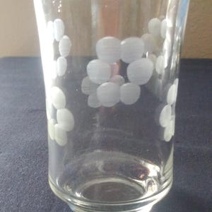 vintage juice glass with etched flowers.