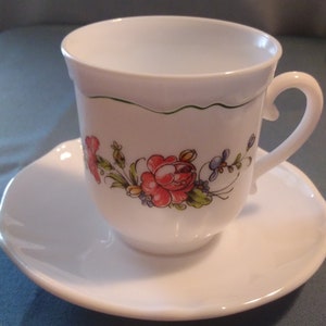 vintage Arcopal, France tea/coffee cup and saucer, milk glass, floral images on a cup.