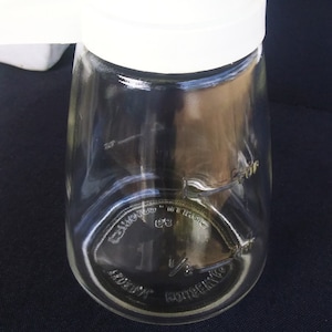 vintage syrup dispencer by Federal Housewares.  Mid-century, glass with a plastic top.