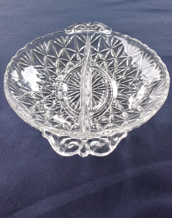 vintage oval divided clear glass dish with handles.
