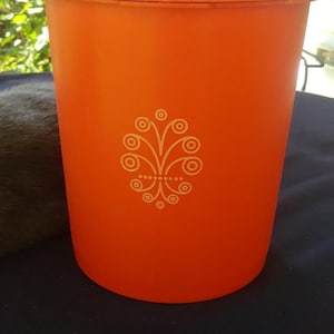 vintage orange Tupperware container.
