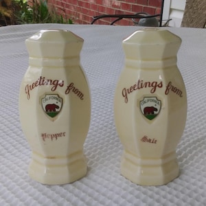 vintage salt & pepper shakers made in Japan.  &quot; Greetings from California &quot; on front along with a California crest with a bear.