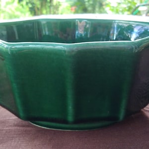 vintage Hull Pottery Co. small planter, glazed forest green with ribbed exterior.
