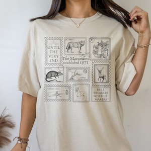 Koszulka z kolekcji znaczków Marauders T-shirt * Wizard Apparel Pocztówka James Moony Remus Sirius ATYD * Book Fandom Merch Prezent dla czytelnika strona 394