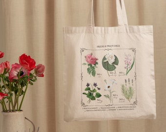 May include: A beige canvas tote bag with a floral design and the text "Pride & Prejudice". The design features five different flowers with their corresponding numbers and descriptions. The flowers are a rose, a water lily, a hyacinth, a violet, and lavender.