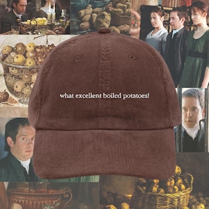 Puede incluir: Una gorra de béisbol de pana marrón con el texto "what excellent boiled potatoes!" bordado en blanco en la parte delantera.